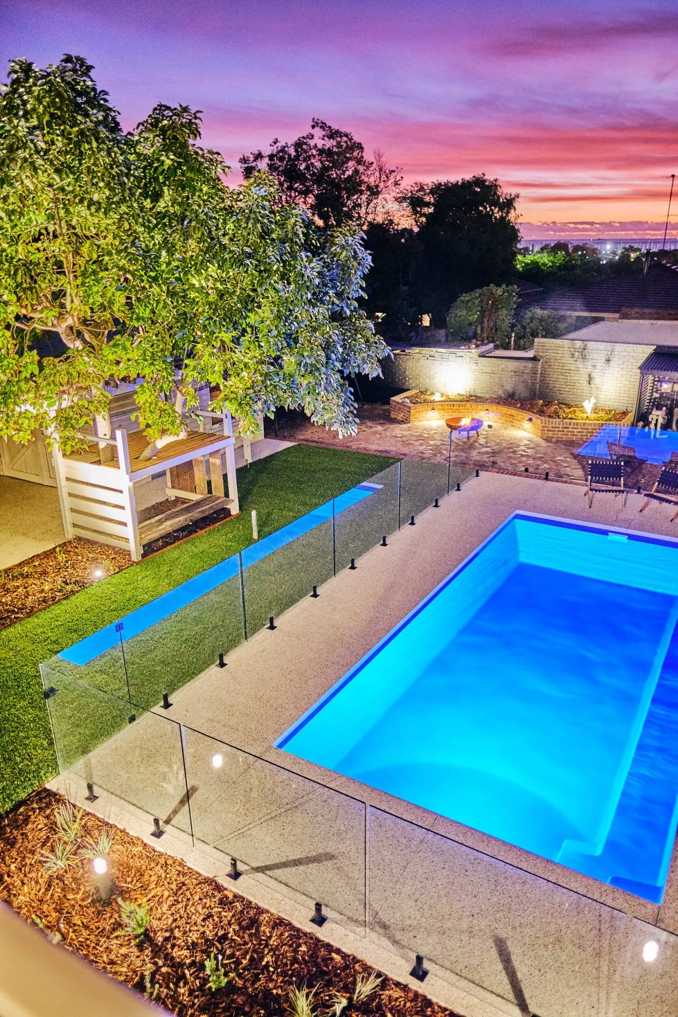 Beaconsfield backyard pool landscape design at dusk, Perth
